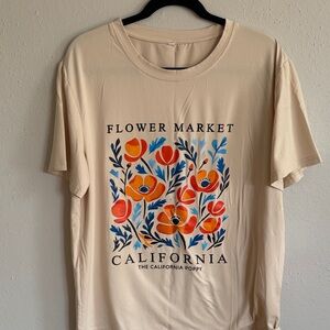 Flower Market California Graphic Tee — Cream with Orange & Blue Florals